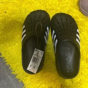 Black adidas slides size 6 women and 5 in men’s brand new with tags